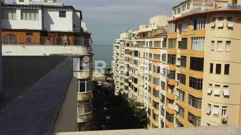 Conheça Vista parcial mar do imóvel - Imóveis Aluguel Sala Comercial Copacabana - LASL00166 - 1 Vista parcial mar - Imóveis Aluguel Sala Comercial Copacabana - LASL00166 - 1