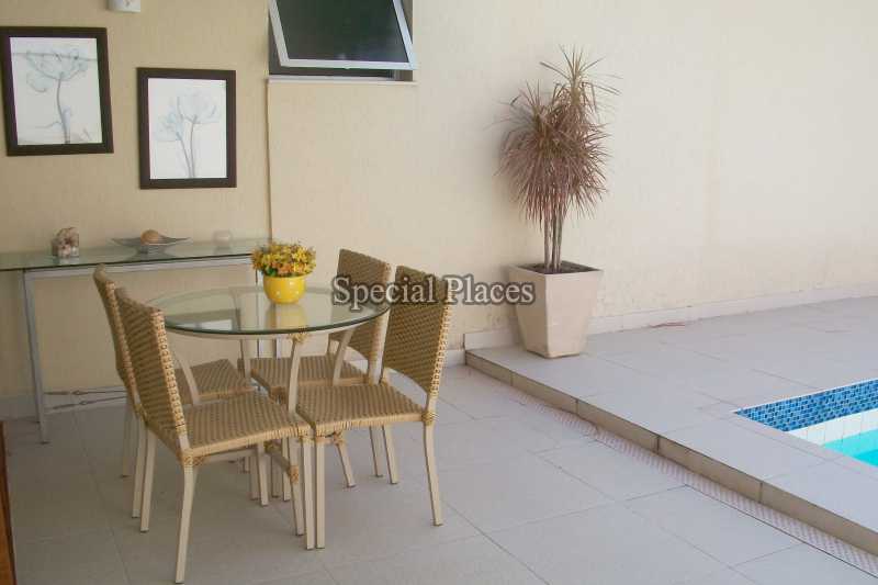 Conheça VARANDÃO DO SALÃO do imóvel - Casa À Venda no Condomínio Barra, Vivendas do Bosque - Barra da Tijuca - Rio de Janeiro - RJ - BAC3652 - 5 VARANDÃO DO SALÃO