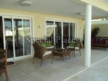 Conheça VARANDA do imóvel - Casa À Venda no Condomínio Barra, Quintas do Rio - Barra da Tijuca - Rio de Janeiro - RJ - BAC3919 - 3 VARANDA