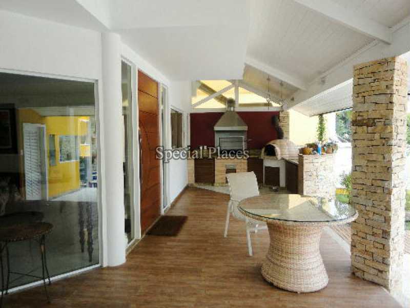 Conheça varandao_churrasqueira do imóvel - Casa em Condomínio Barra, Sernambetiba Jardim Marapendi, Barra da Tijuca, Rio de Janeiro, RJ Para Alugar, 4 Quartos, 580m² - LOC1101 - 31 varandao_churrasqueira