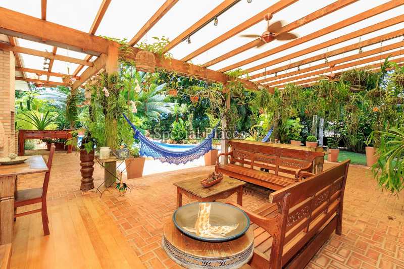 Conheça Varanda Térrea 3 do imóvel - Casa À Venda no Condomínio Barra, Jardim Barra da Tijuca - Barra da Tijuca - Rio de Janeiro - RJ - BAC6057 - 8 Varanda Térrea 3