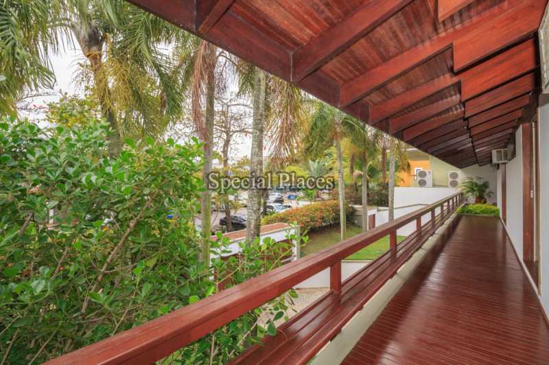 Conheça VARANDÃO do imóvel - Casa Para Alugar no Condomínio Barra, Novo Leblon - Barra da Tijuca - Rio de Janeiro - RJ - LOC1157 - 4 VARANDÃO