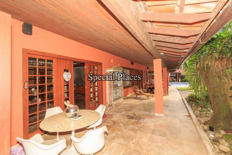 Conheça 9 - VARANDA LATERAL do imóvel - Casa em Condominio Condomínio Itanhangá, Itanhangá,Rio de Janeiro,RJ Para Alugar,4 Quartos,838m² - LOC1103A - 10 9 - VARANDA LATERAL