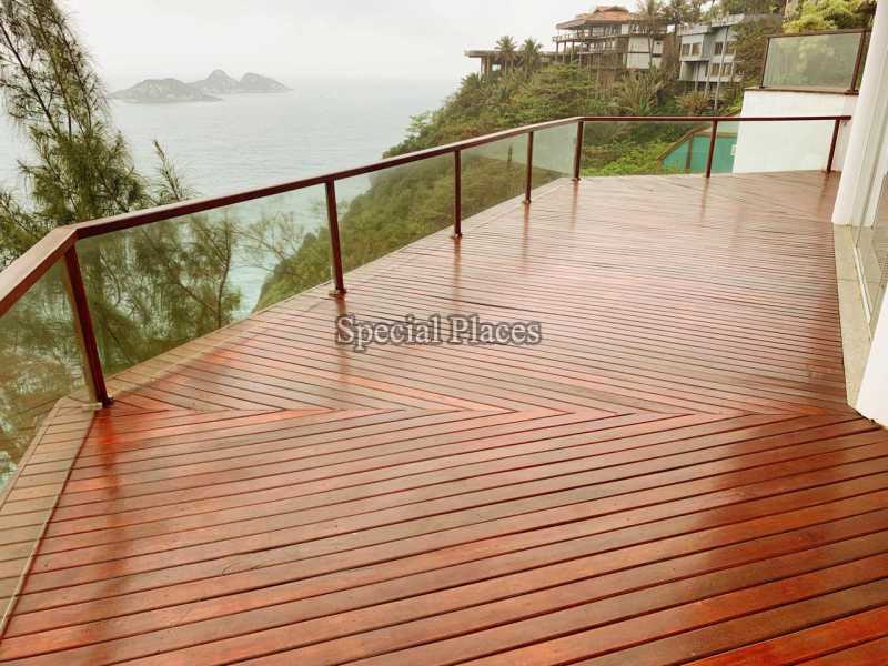 Conheça VARANDÃO SUITE MASTER do imóvel - Casa em Condomínio Joatinga, Joá, Rio de Janeiro, RJ Para Alugar, 4 Quartos, 686m² - LOC1203A - 22 VARANDÃO SUITE MASTER