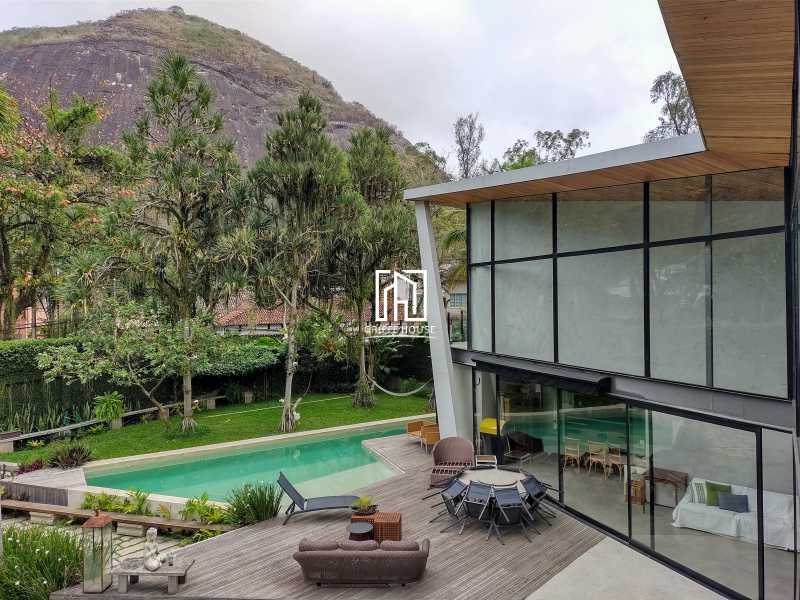 Vista da Varanda suíte master - Casa a venda em condomínio fechado no Itanhangá, uma obra de arte projetada por renomado arquiteto. - GHCN50039 - 30