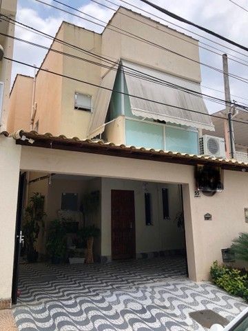 Casa à venda com 4 quartos, 90m² - Foto 2