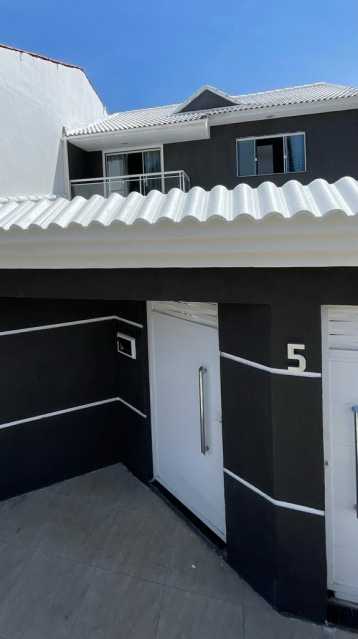 Casa à venda com 4 quartos, 90m² - Foto 1